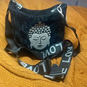 Koala kanvas black fashion designer hand bag with a  Buddha logo.